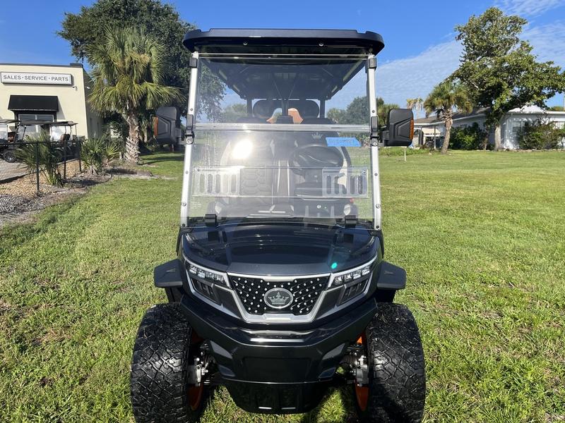 Side profile of 2025 Evolution D-Max XT6 black golf cart available in Pennsylvania with nationwide delivery and export