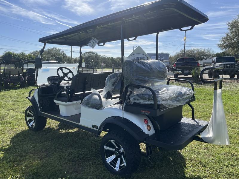 Dashboard interior of 2025 Evolution Forester 6 Plus white golf cart available in Alabama