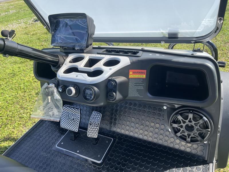 Interior seating of 2025 Evolution Forester 6 Plus white, six-passenger golf cart available in Alabama