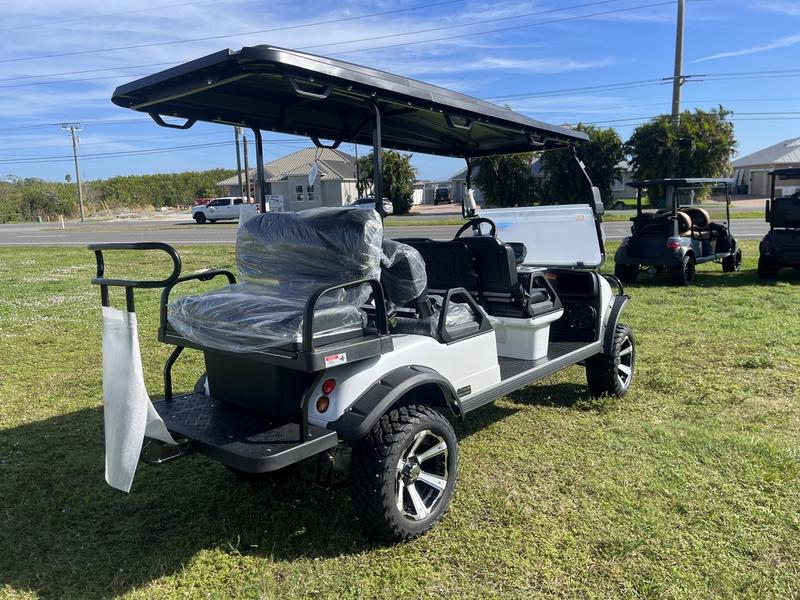 Rear view of 2025 Evolution Forester 6 Plus white electric golf cart available in Alabama