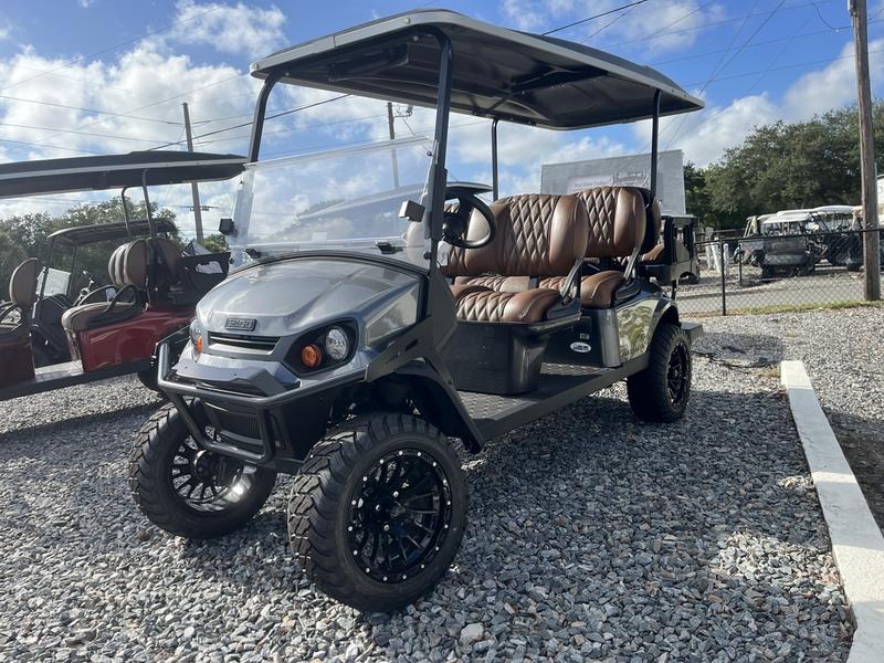 Side view of 2025 E-Z-GO Express 6 Gas Inferno Red in Phoenix Arizona