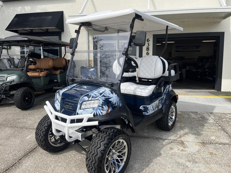 Side view of 2026 Club Car Onward Lifted 4 Passenger Gas golf cart in Georgia