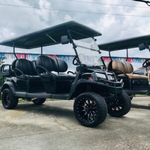 Side view of 2026 Club Car Onward Lifted 6 Passenger Gas black golf cart in Ohio