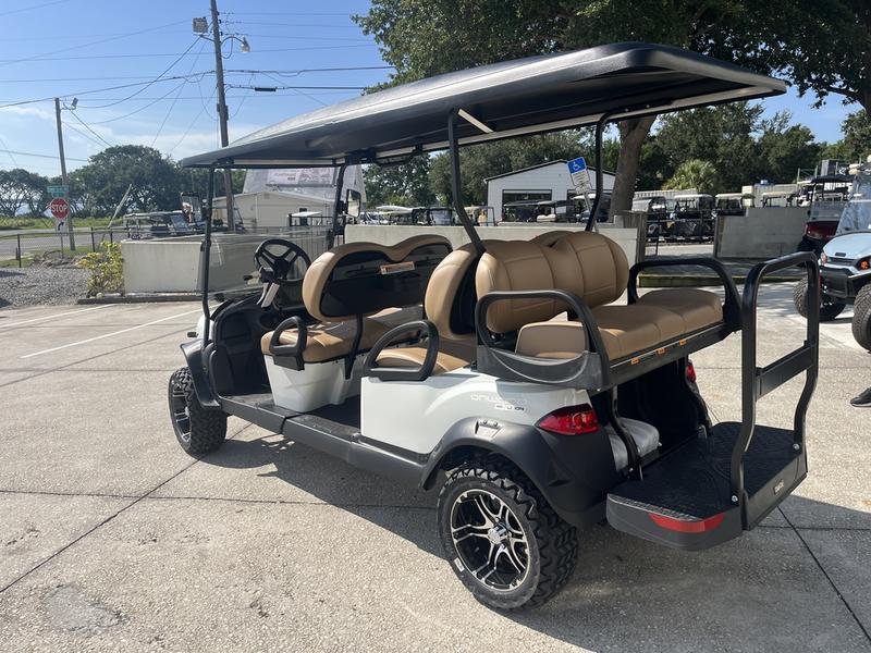 Rear fold-down seat and cargo platform on 2026 Club Car Onward Lifted HP Lithium Tennessee