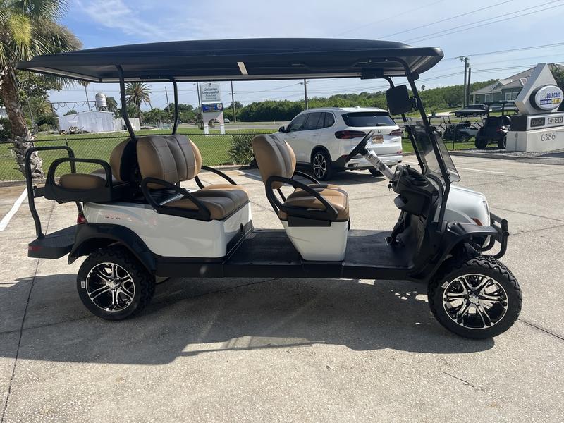 Side view of 2026 Club Car Onward Lifted 6 Passenger HP Lithium golf cart in Tennessee